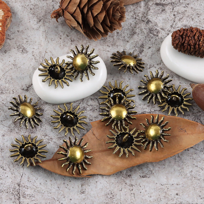 Gold sunflower metal shank button set, dark centers, spiked petal design