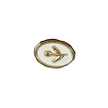 Tulip oval metal shank button, gold-tone rim, tulip emblem on white base