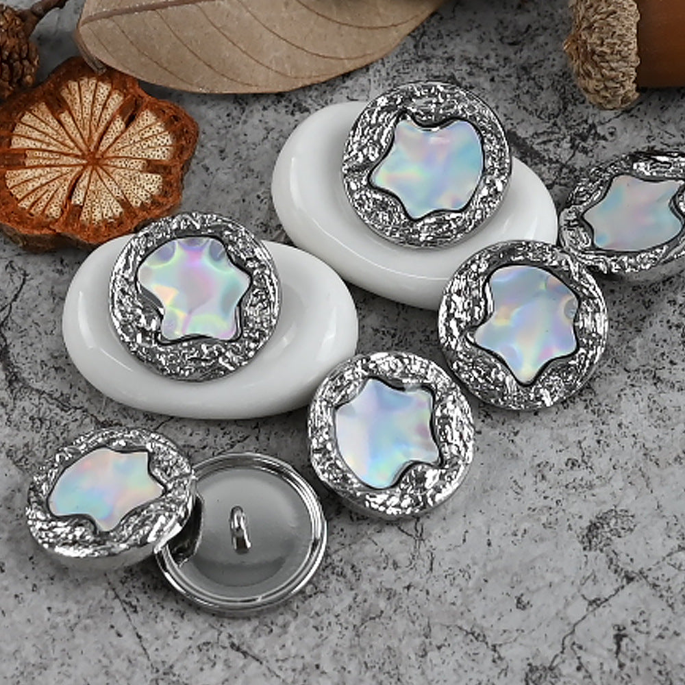 Iridescent front shank buttons with glittered metal frames in silver tones