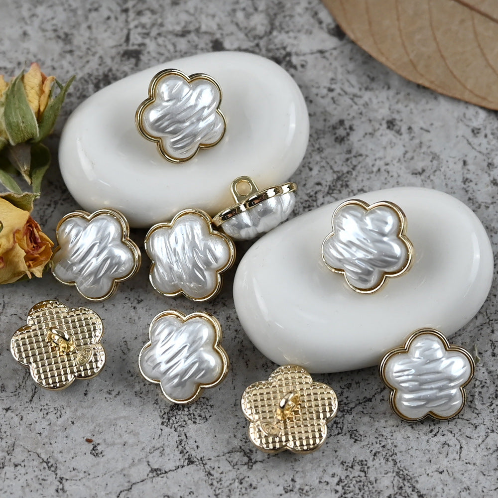 3D small floral button with shank, gold-tone rim and white center, 14mm
