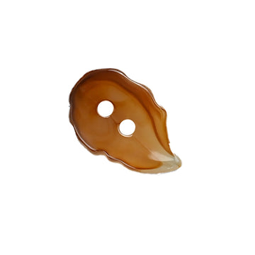 Amber leaf-shaped resin button, two holes, irregular edge, close-up