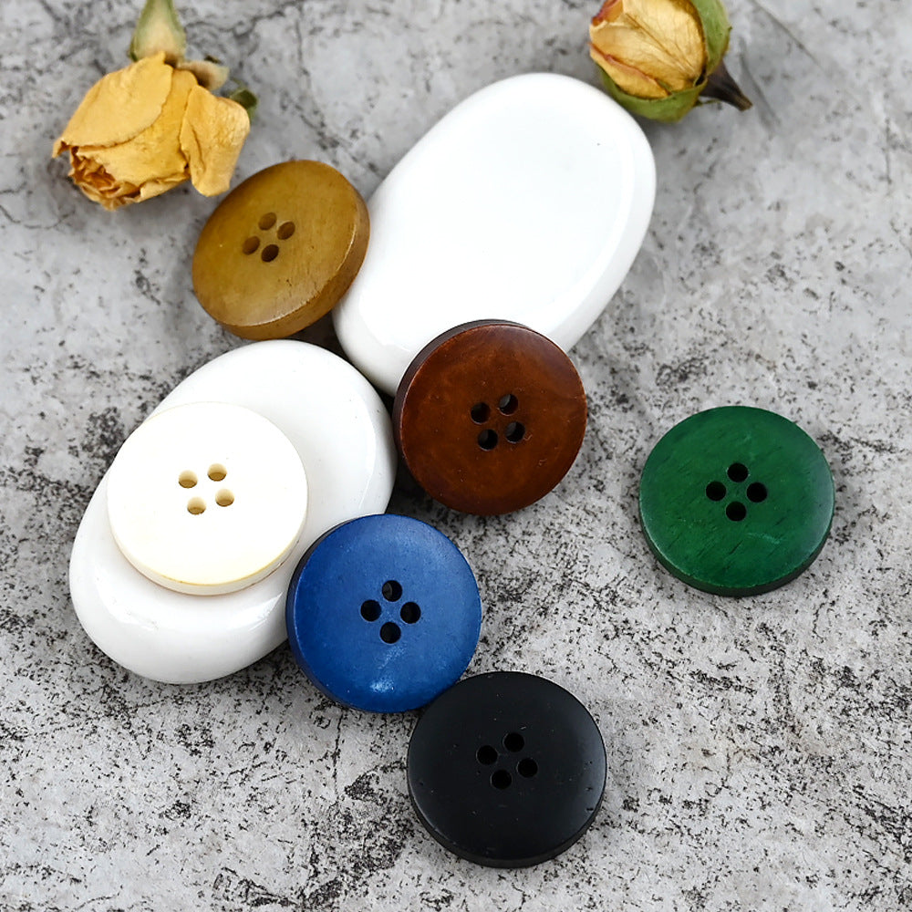 Round 4-hole cow bone buttons: white, blue, brown, green, and black