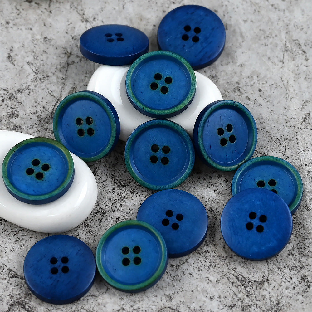 Blue round 4-hole cow bone buttons with dark stitching edge, multiple pieces