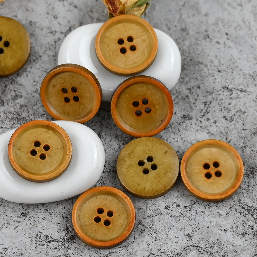Beige/gold round 4-hole cow bone buttons with brown rim, vintage look