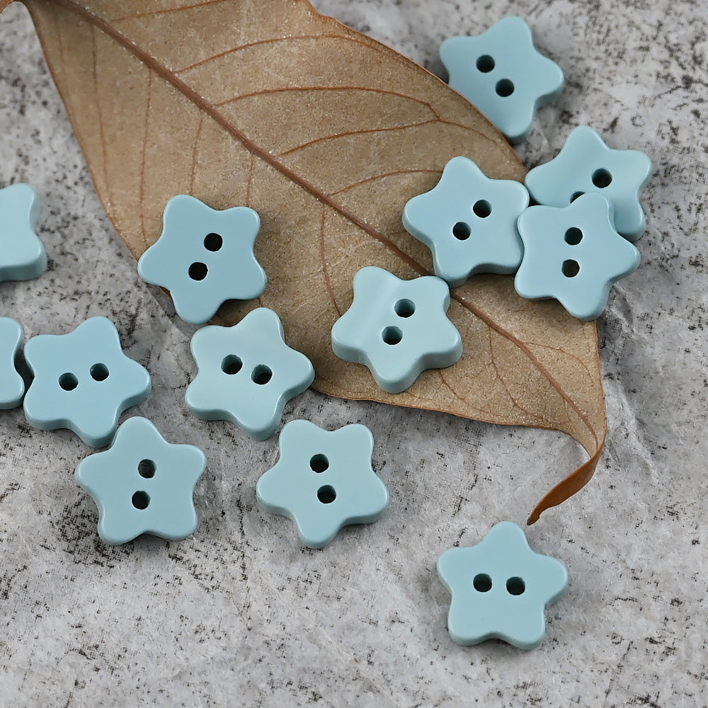 Sky blue star-shaped delicate buttons, four holes