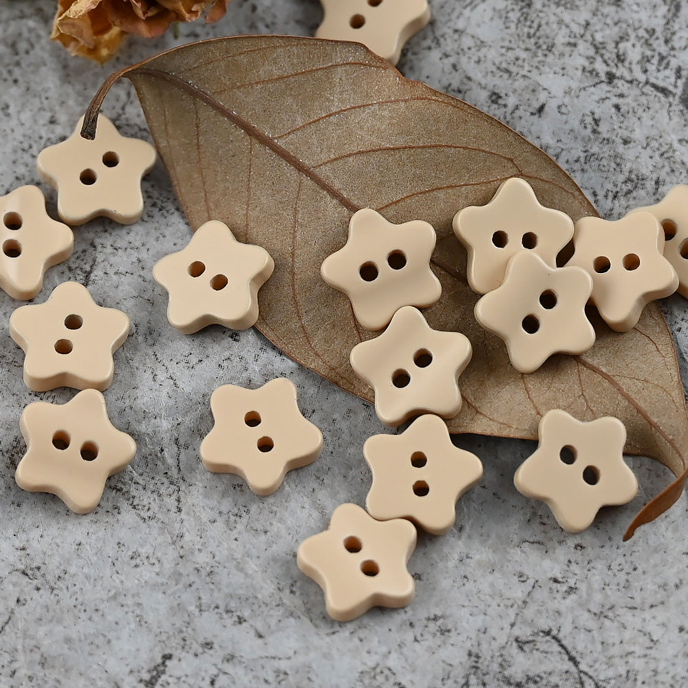 Beige/khaki star-shaped delicate buttons with four holes