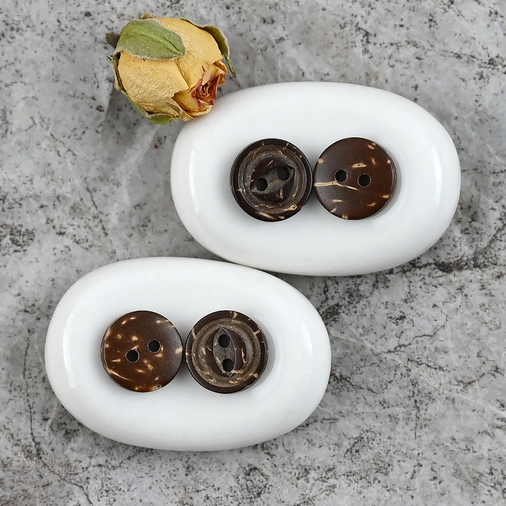 Pair of dark brown coconut shell buttons, round, 2-hole, glossy natural finish