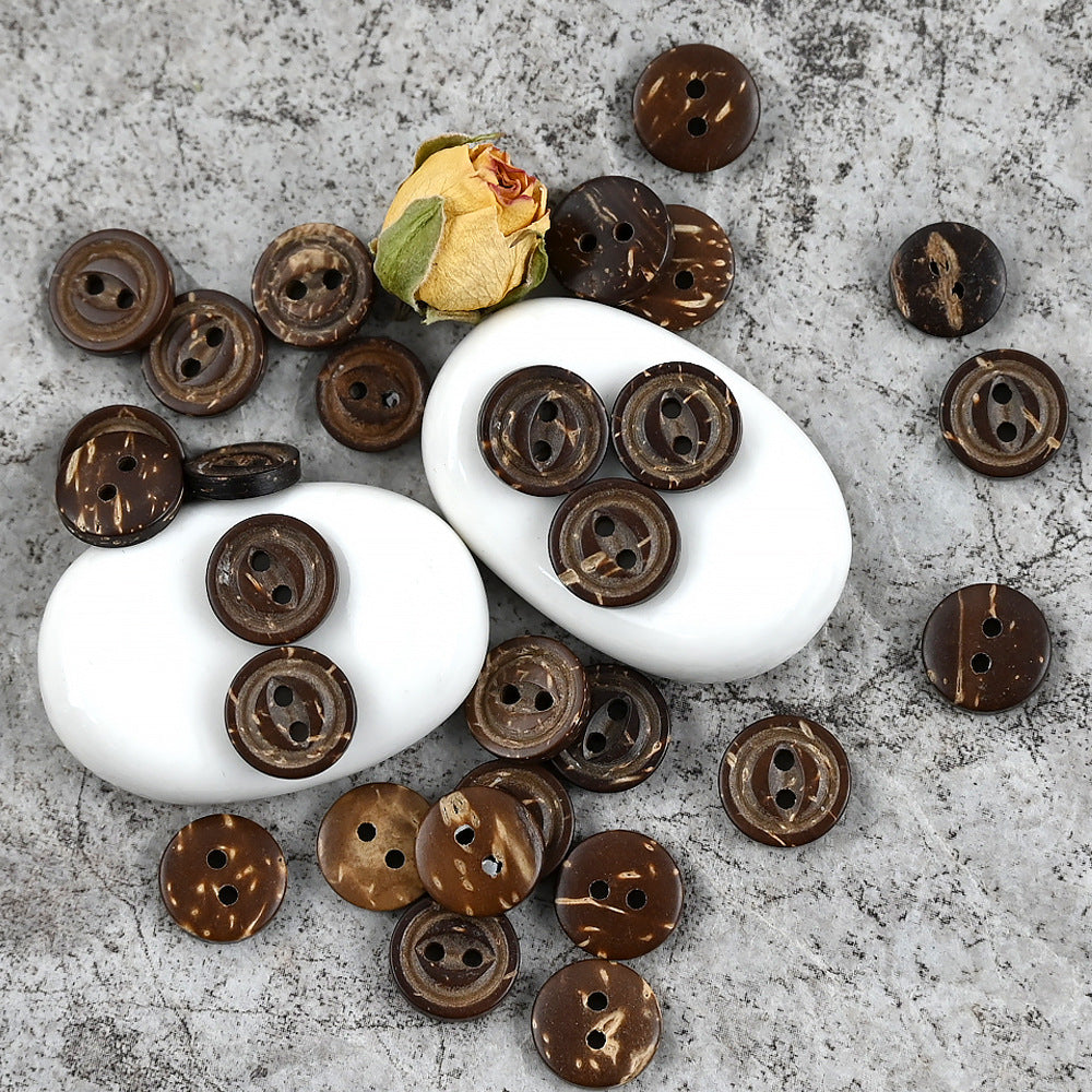 Assorted dark brown coconut shell buttons, round, 2-hole, varied carved ring details