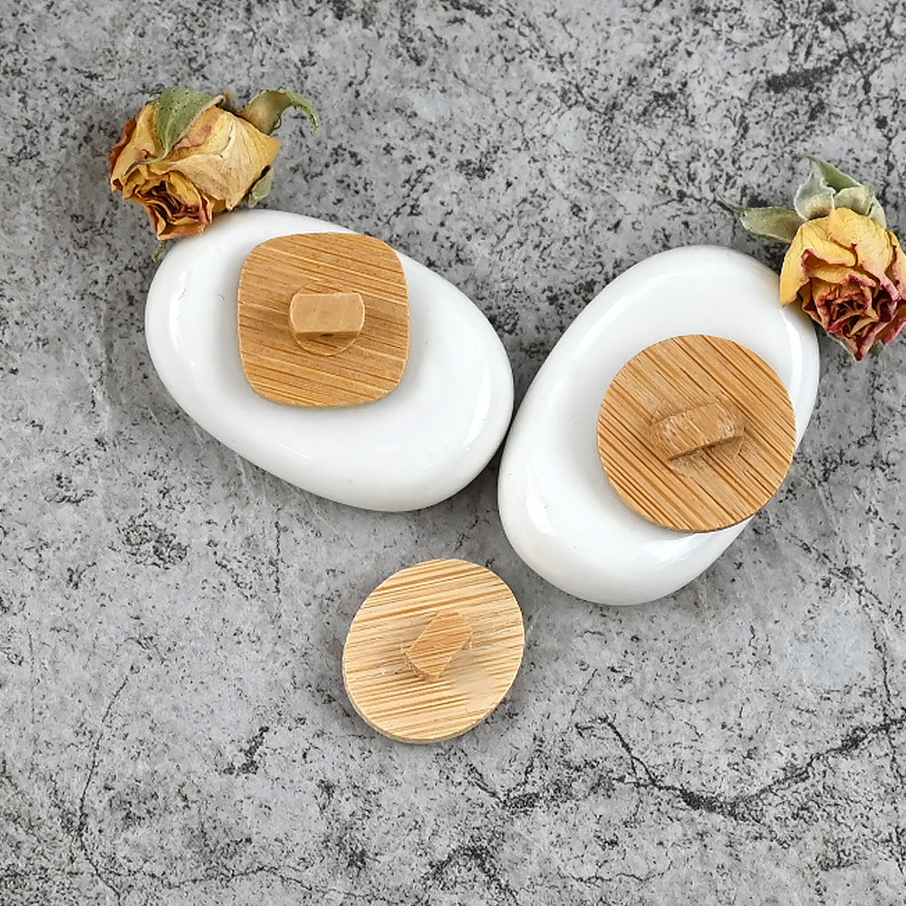 Natural bamboo shank mushroom buttons, square wooden face on white caps