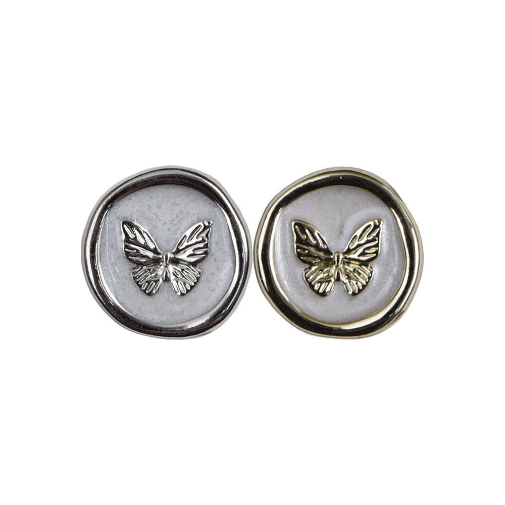 Silver and gold butterfly shank buttons, round metal with butterfly motif, 2 shown