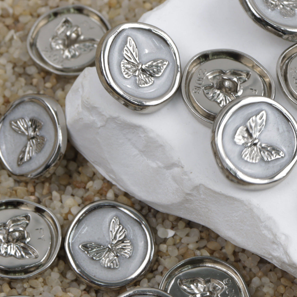 Silver butterfly metal shank buttons, round metal with winged butterfly motif, multiple pieces