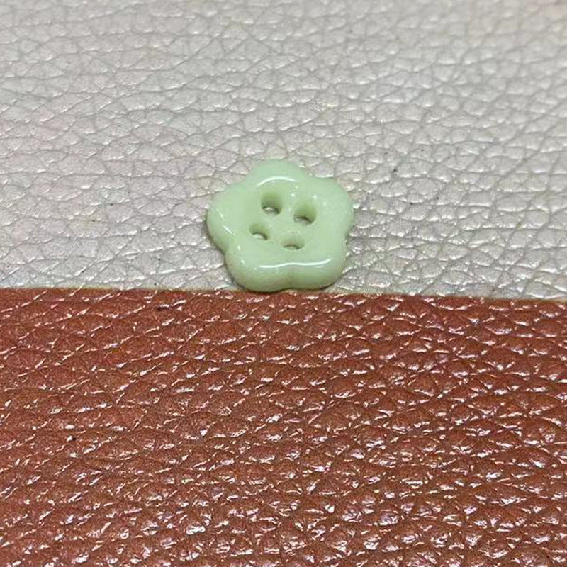 Ceramic flower-shaped 4-hole button, mint green