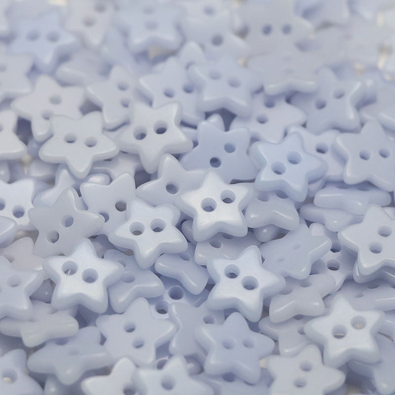 Light blue five-point star ceramic buttons with two holes