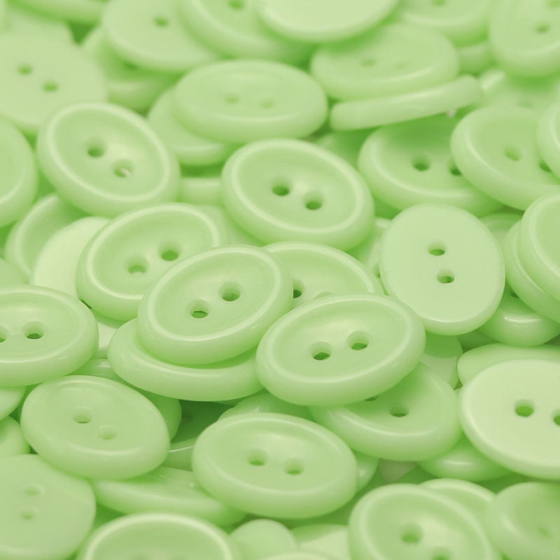 Ceramic round button, 2-hole, light green macaroon color