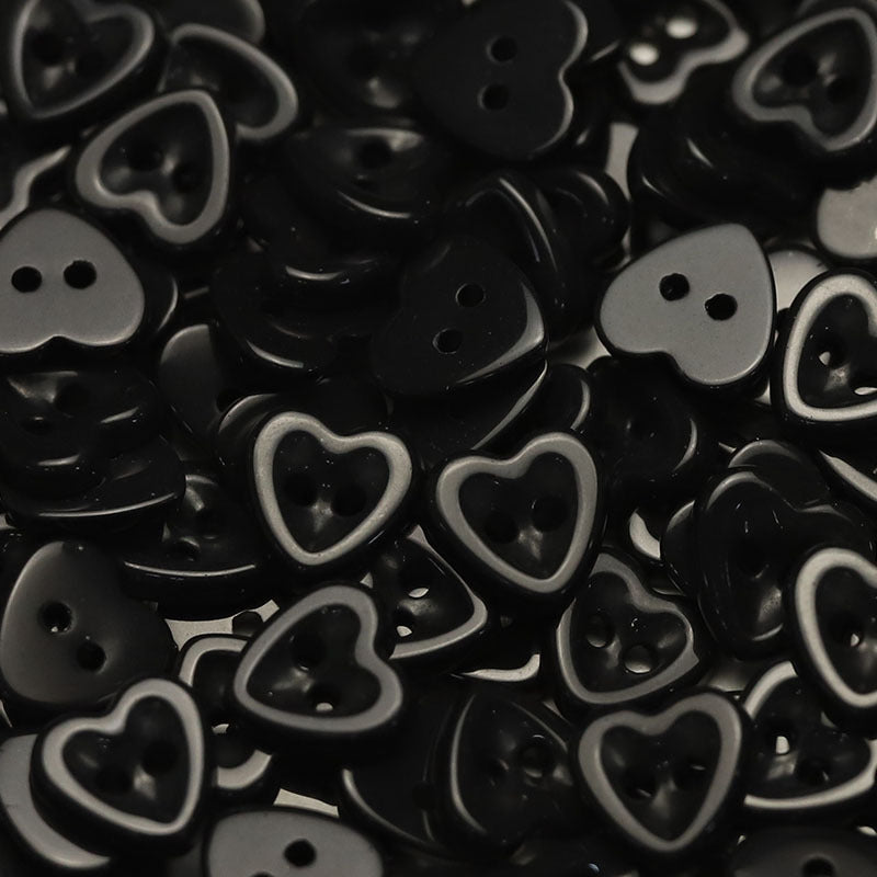 Heart-shaped ceramic buttons, black with white edges, 2-hole