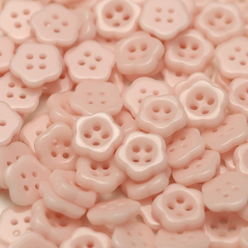 Light pink flower-shaped ceramic buttons with four holes, kids clothing sewing