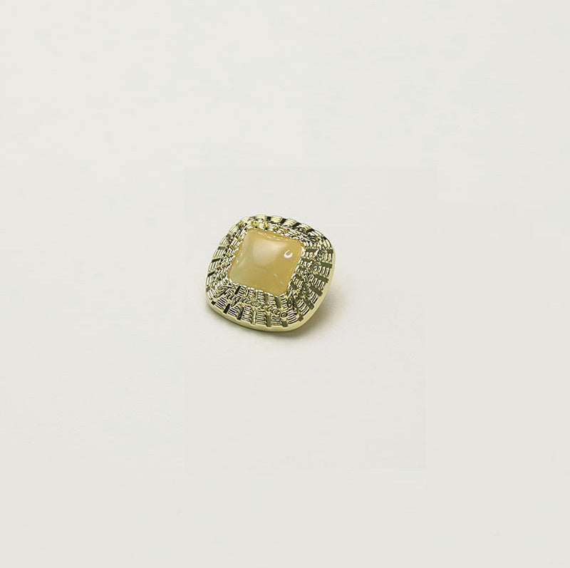 Square gold metal button with cream square insert and decorative edge