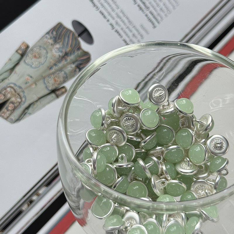 Jar of mint green jelly alloy buttons with silver shanks