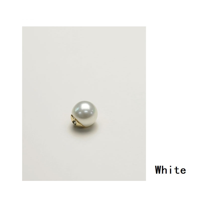 White glossy pearl shirt button with gold-tone metal base and loop hole