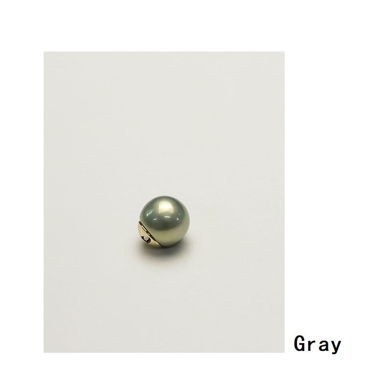 Gray glossy pearl shirt button with gold-tone metal base and loop hole