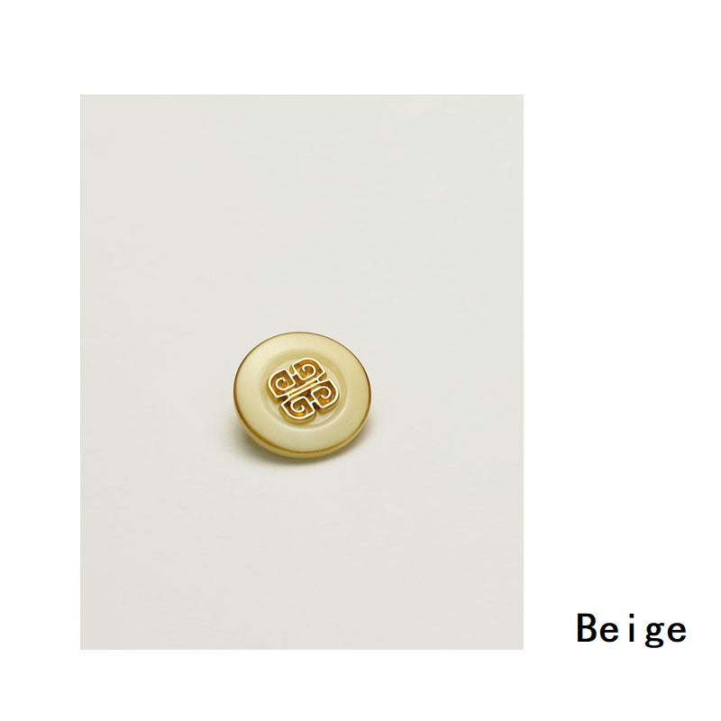 Beige Chinese-style metal button with gold filigree knot design, round front