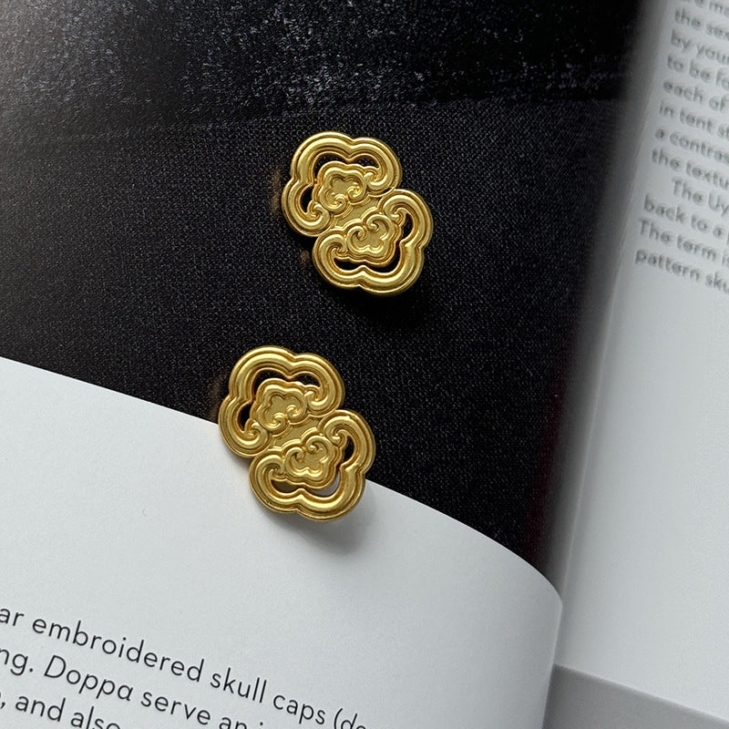 Set of two gold ruyi cloud metal buttons with scrollwork details