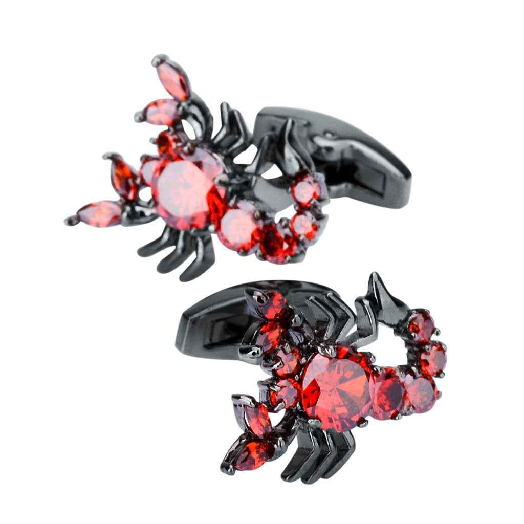 Black-metal scorpion cufflinks, large red center stone with smaller accents
