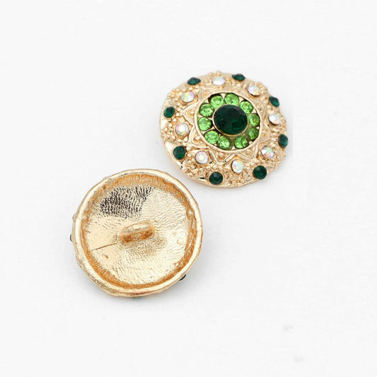 Gold round rhinestone button with green center; shows back with metal shank