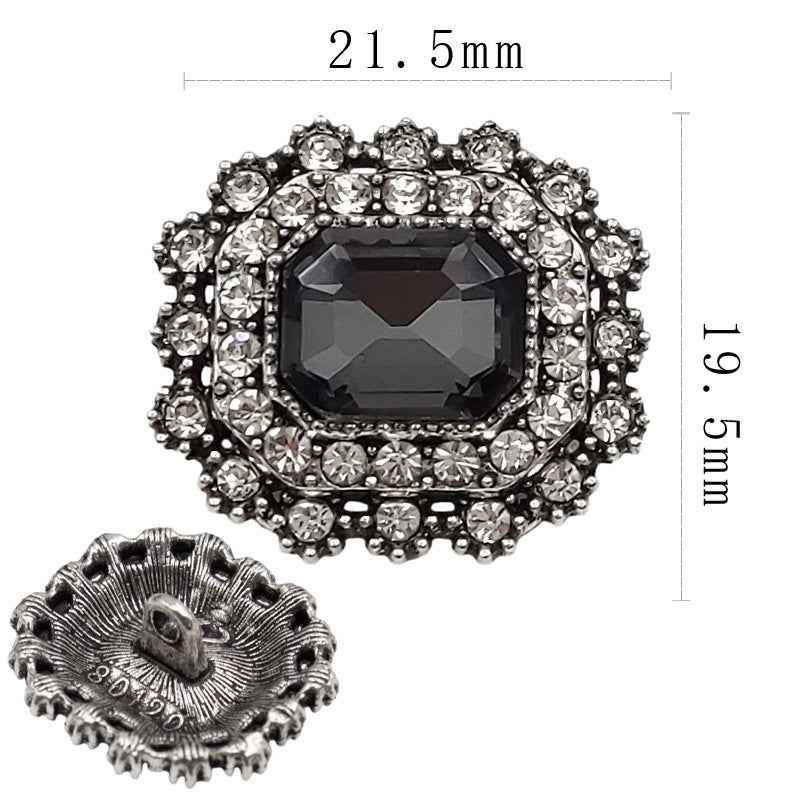 Glas-Strassknopf mit schwarzem Großstein, silberfarbener Rahmen, Maße 19,5 mm