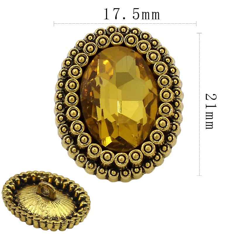 Goldfarbene ovale Strassknöpfe, gelber Stein; Rückseite mit Nadel; Größe 17,5 mm
