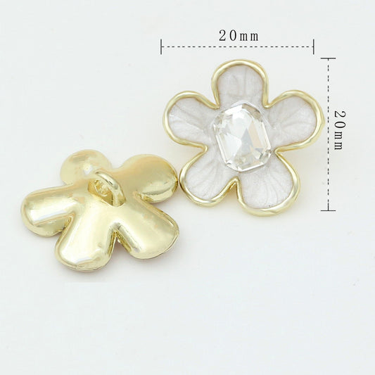 20mm enamel camellia metal shank button, white petals with clear stone; gold back shown