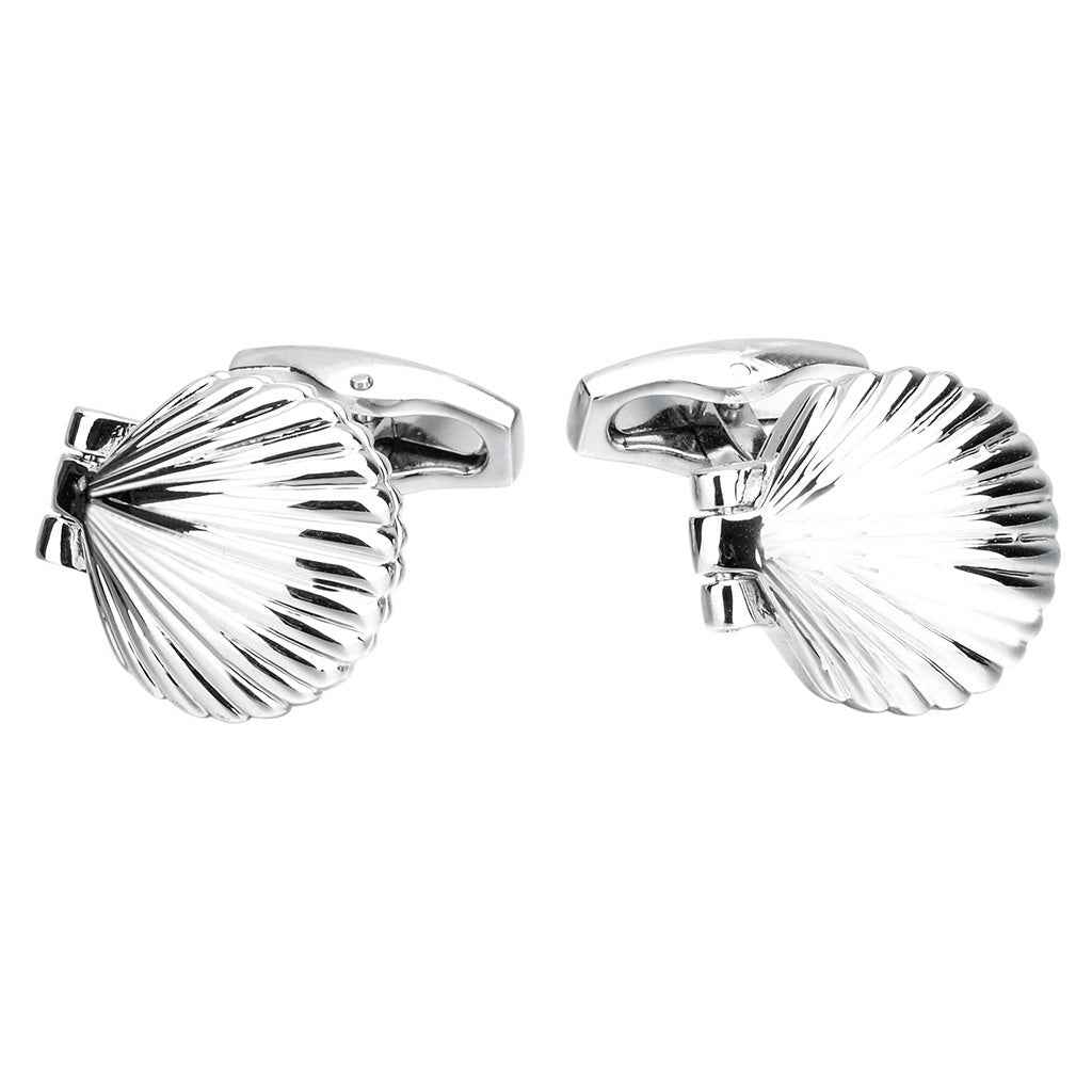 Pair of silver-tone shell-shaped cufflinks, fan-like ridges, open hinged backs