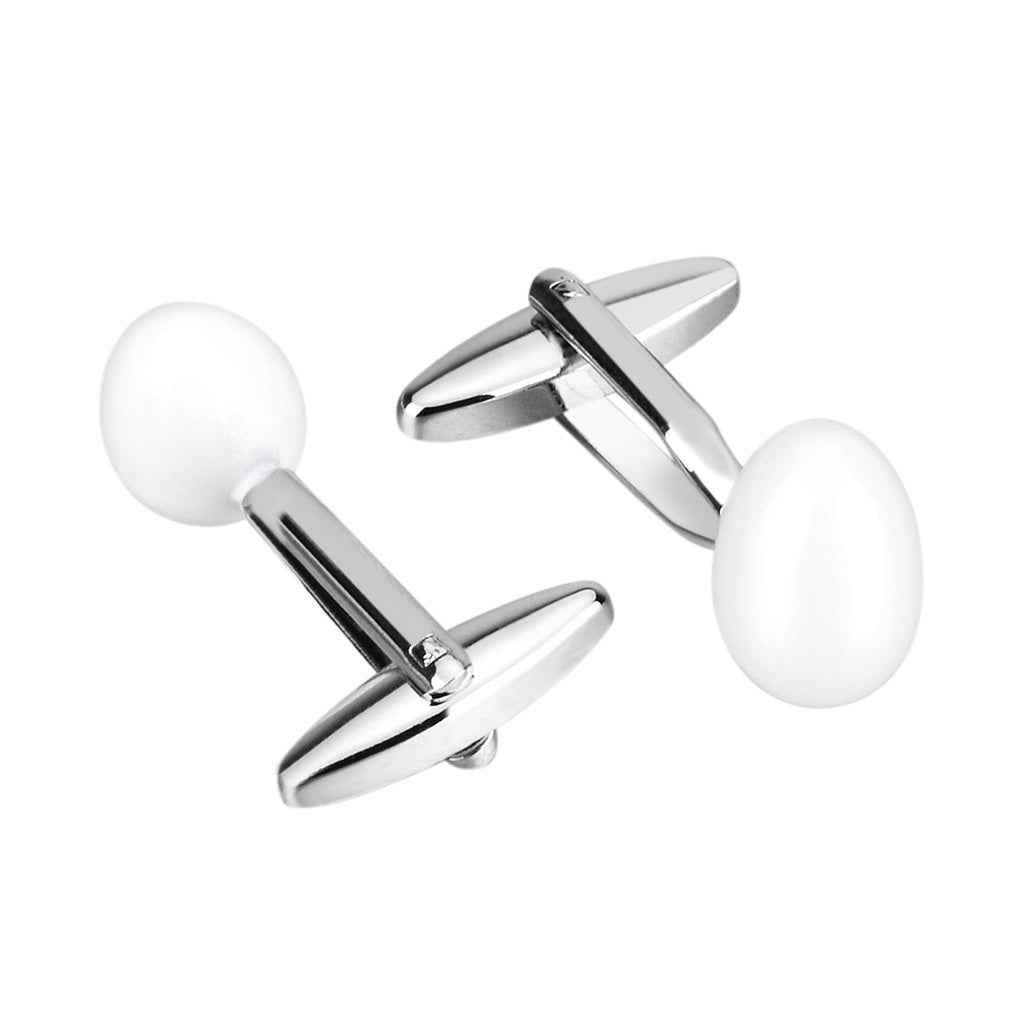 Pair of white oval egg cufflinks with silver frames and hinge backs