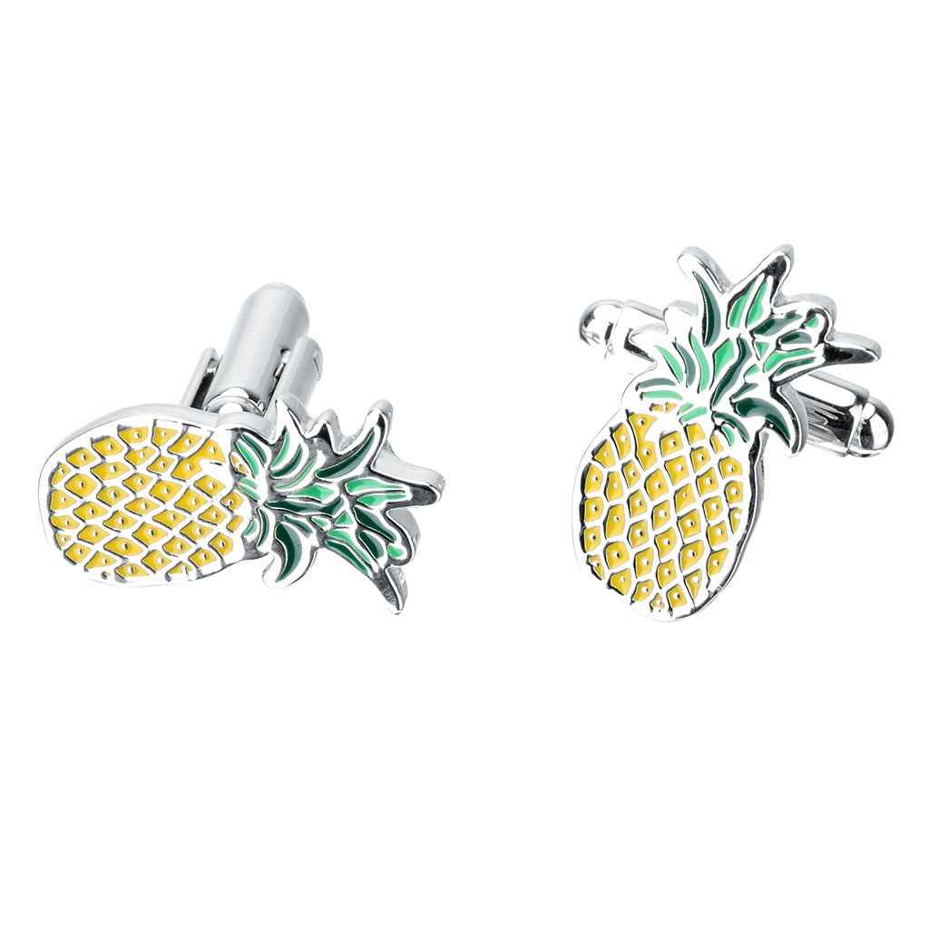 Pair of pineapple cufflinks showing polished posts and enamel green leaves