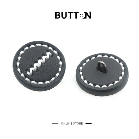 Black round leather button tops and backs with stitched border and metal shank; 1-inch