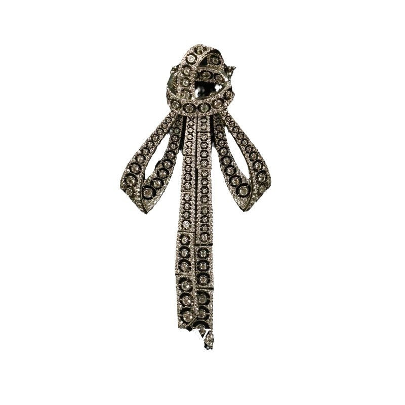 Vintage butterfly bow brooch, copper-toned, full rhinestone detailing