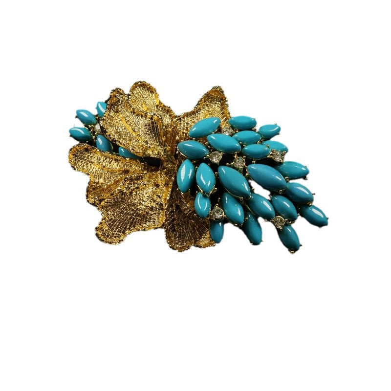 Grape brooch coat pin with goldtone leaves and blue teardrop rhinestones