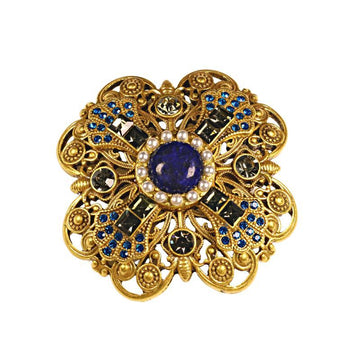 Gold-tone filigree brooch with blue rhinestones, lapis-lazuli center, faux pearls