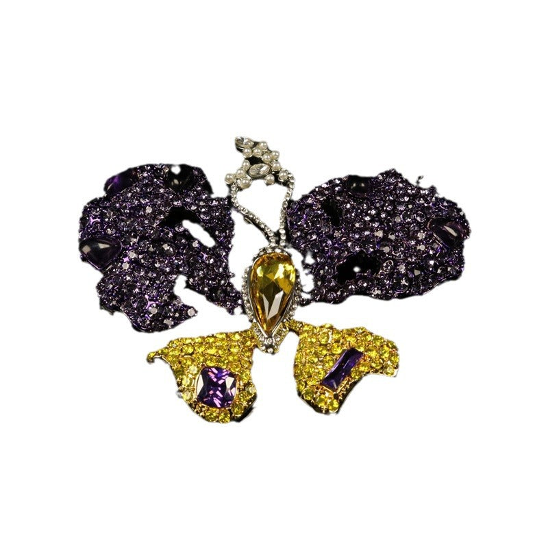 Purple rhinestone butterfly brooch pin, yellow teardrop center and gem accents