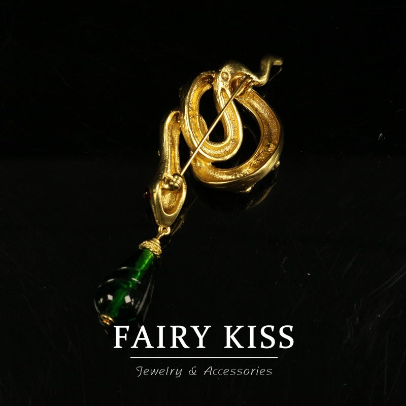 Snake pendant brooch, gold-tone with green enamel stones and hinged pin/back