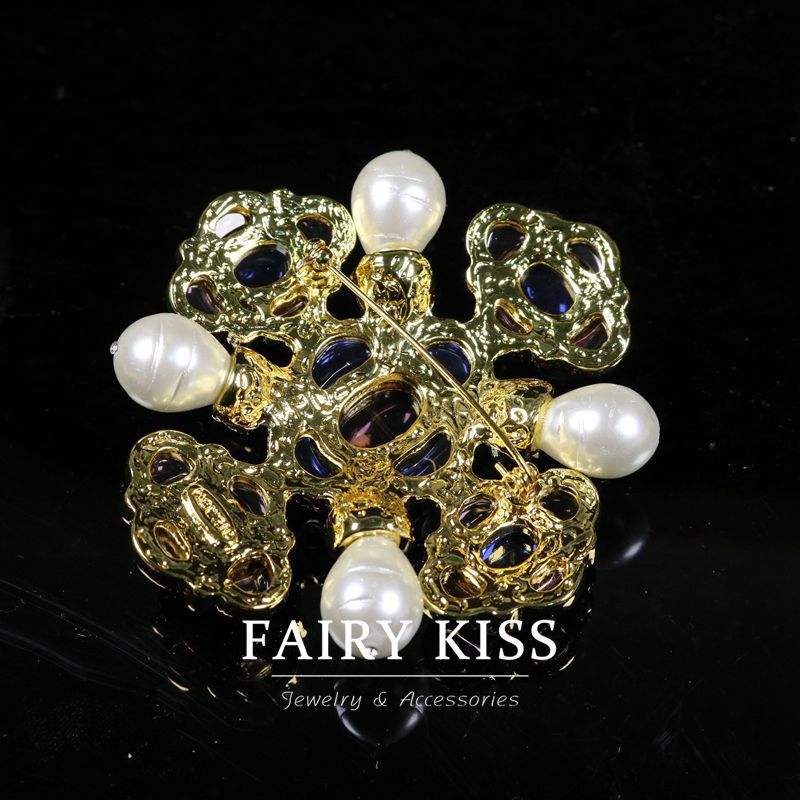 Gold-tone filigree pin brooch, blue stones and round white pearls with secure clasp