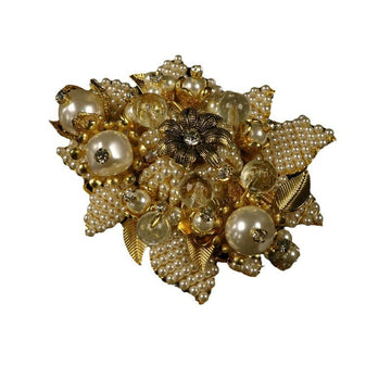 Gold beaded flower brooch with faux pearls, glass stones, and leaf accents.