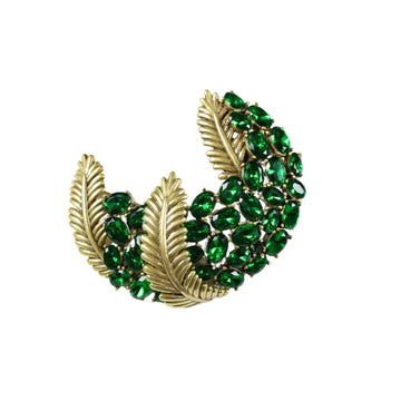 Green rhinestone diamond-encrusted feather brooch with copper leaf detail