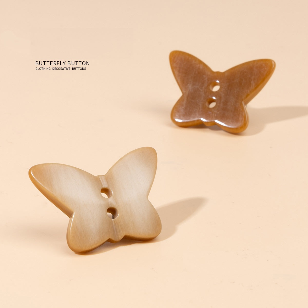 Khaki butterfly resin buttons, two-hole sewing holes, front view, multiple pieces