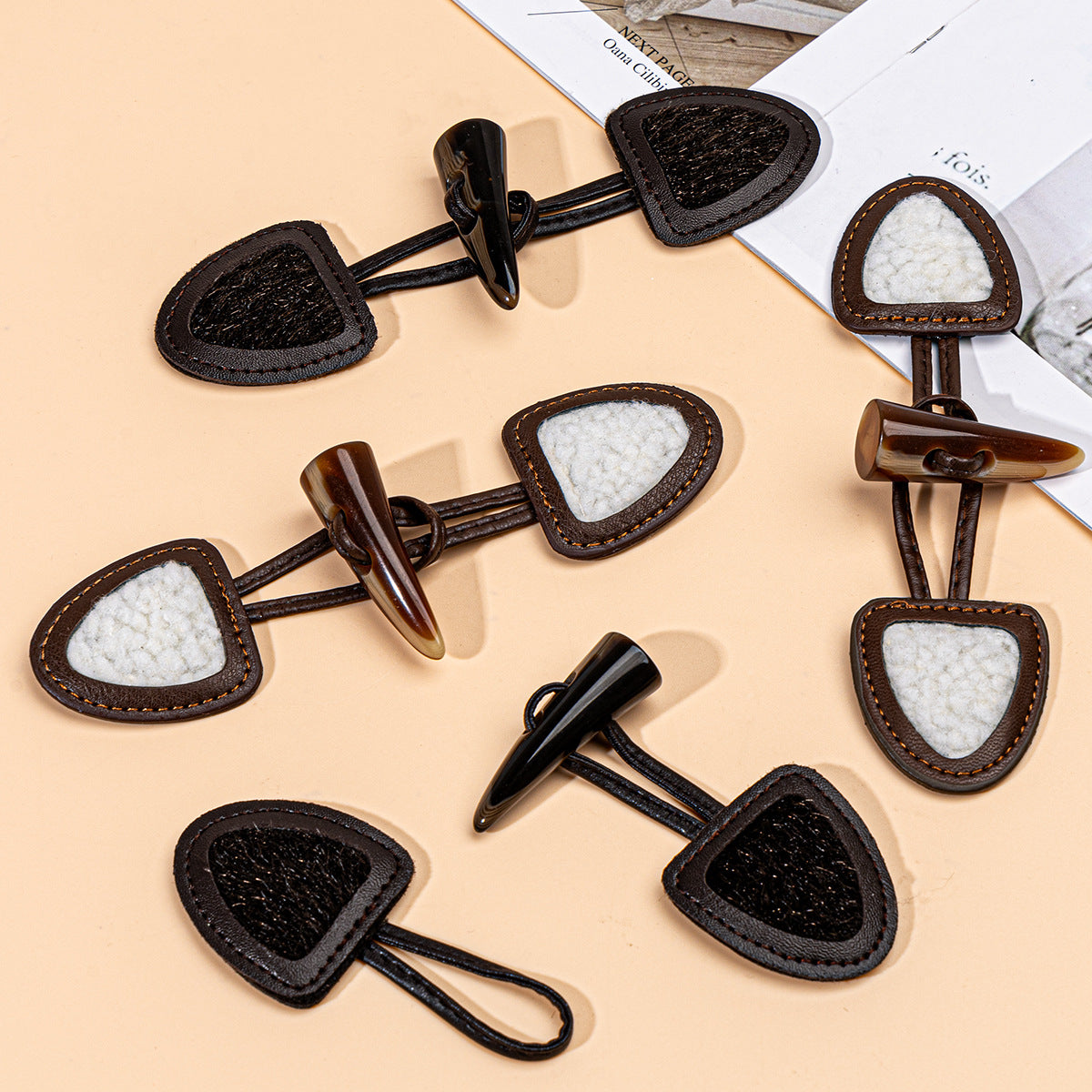 Sew-on toggles set with resin horn buttons, dark coffee and brown leather panels