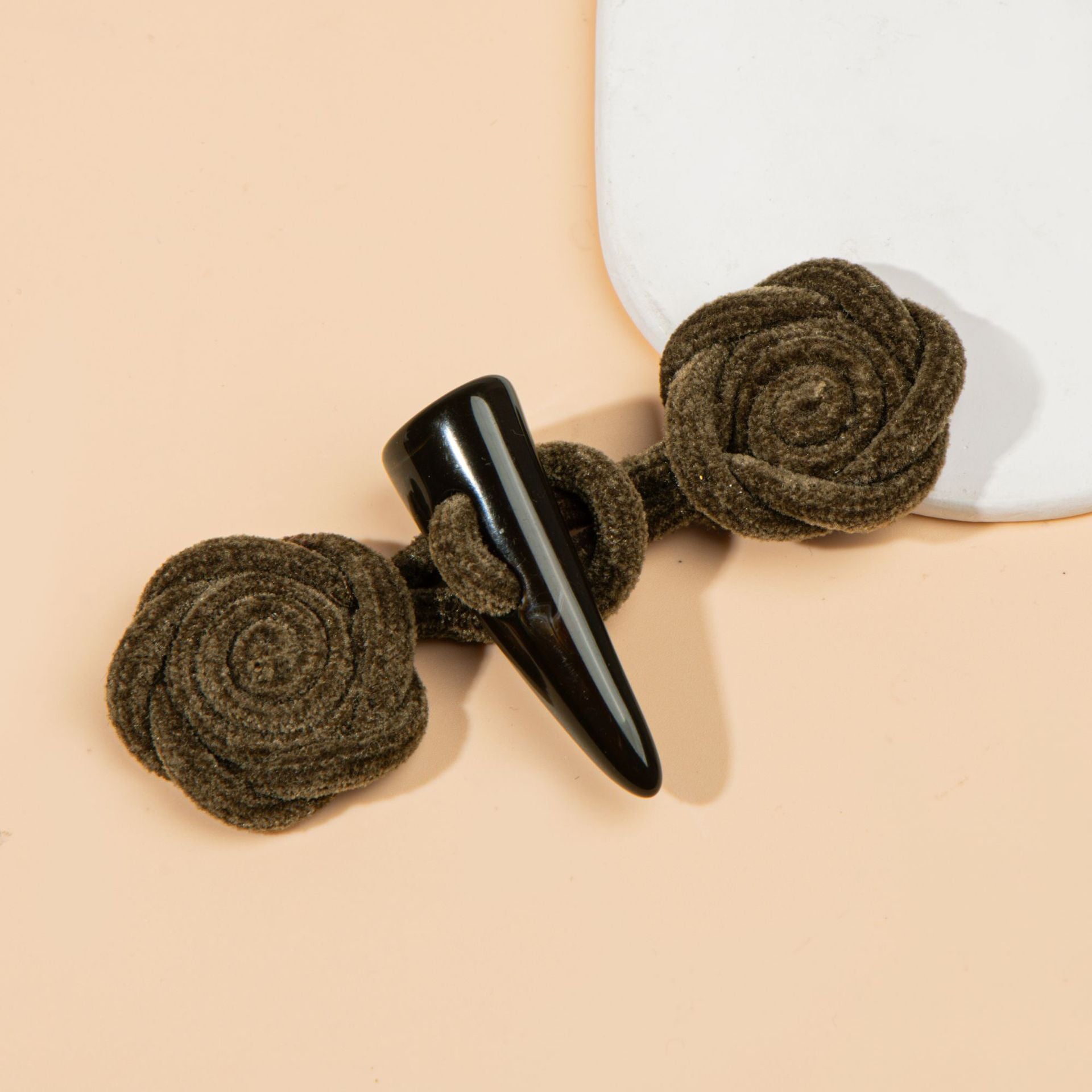 Corduroy rose sew-on toggle buttons in dark olive brown with black resin horn tips