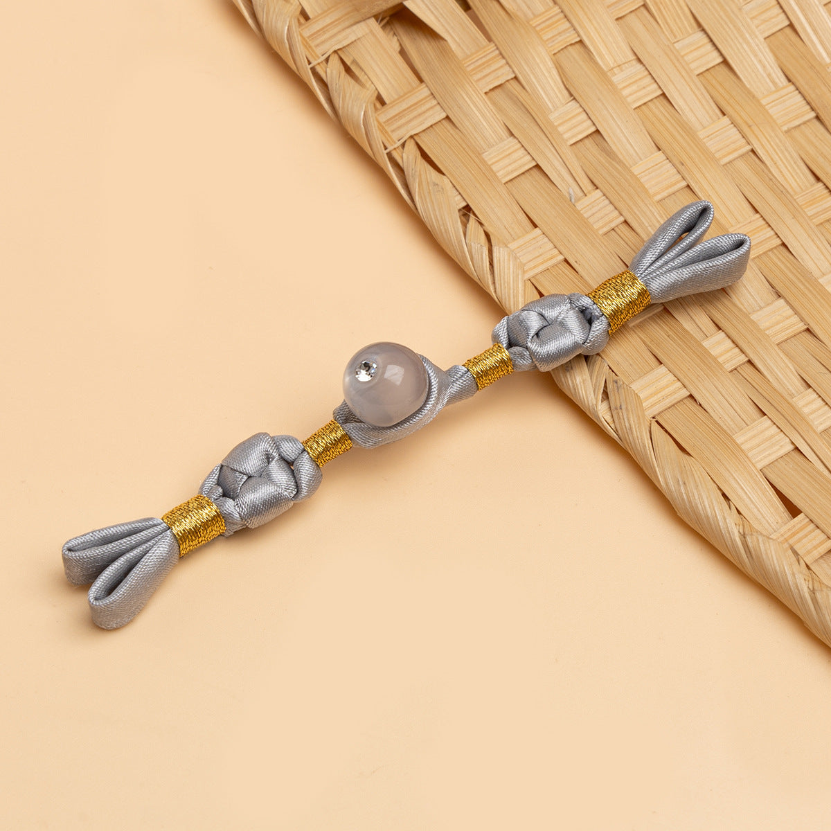 Silver-gray cheongsam panko with braided cords and gray round stone button