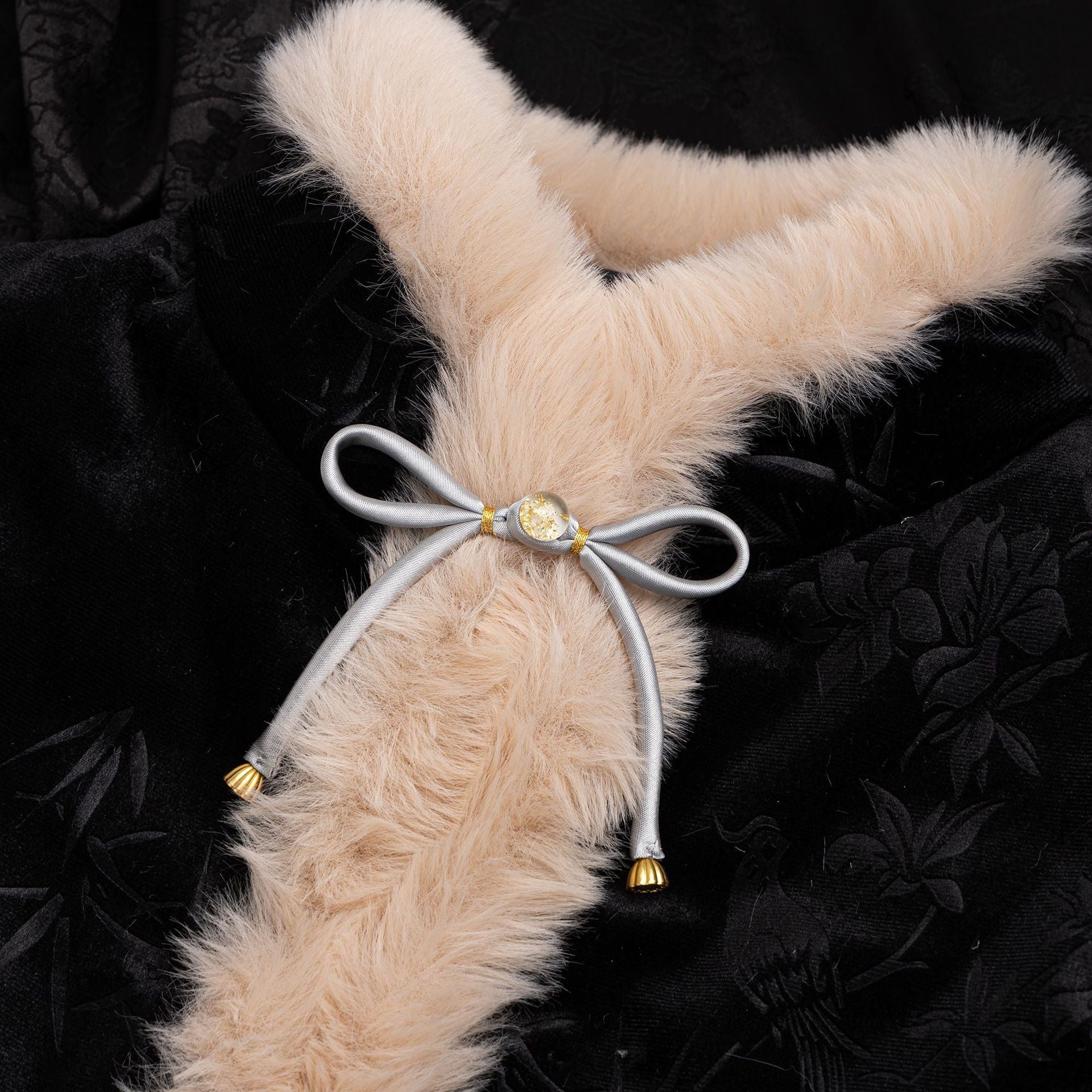 Faux fur scarf button clasp with satin bow, silver-gray ribbon loops and round gold-tone center