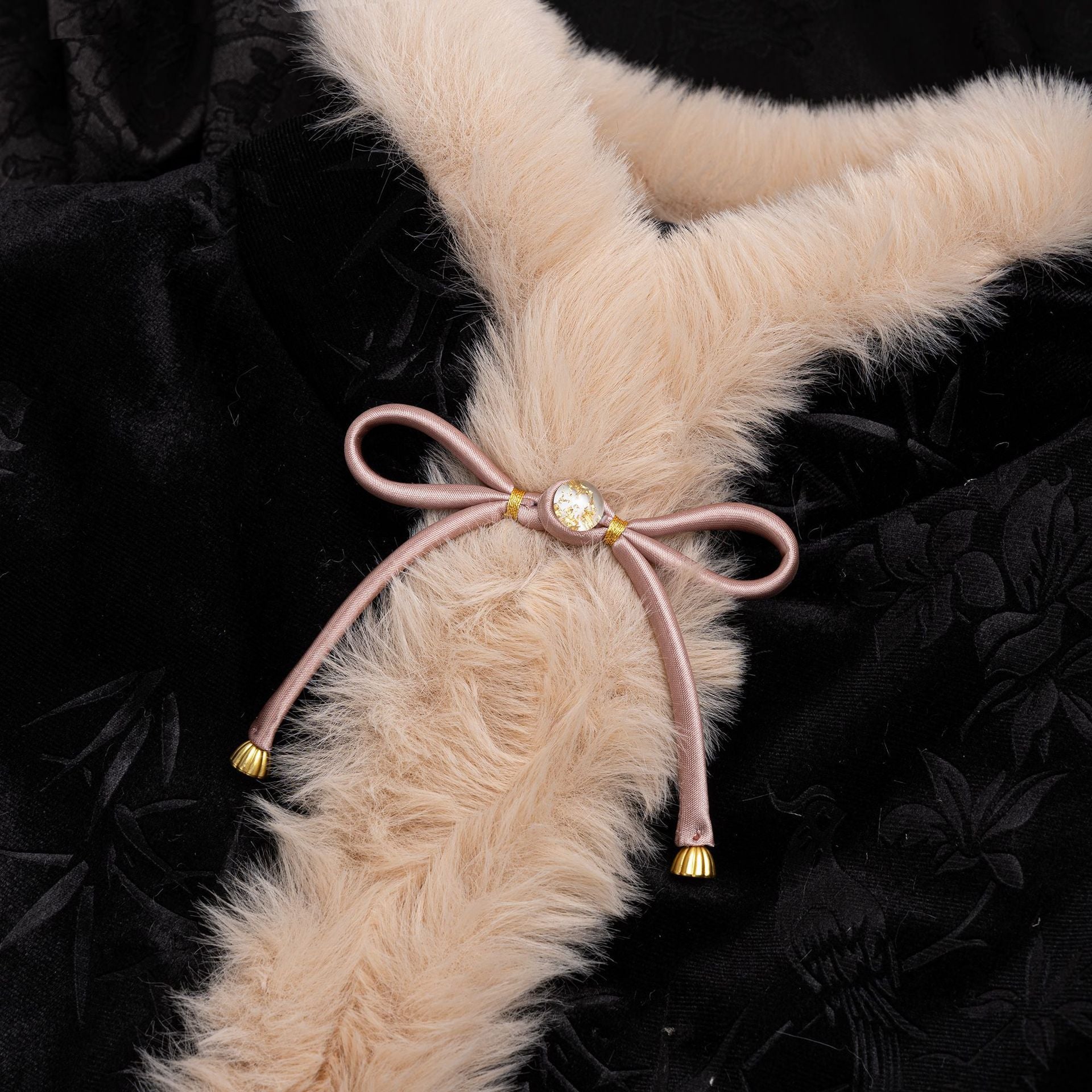 Faux fur scarf button clasp with satin bow, blush-pink ribbon loops and round gold-tone center