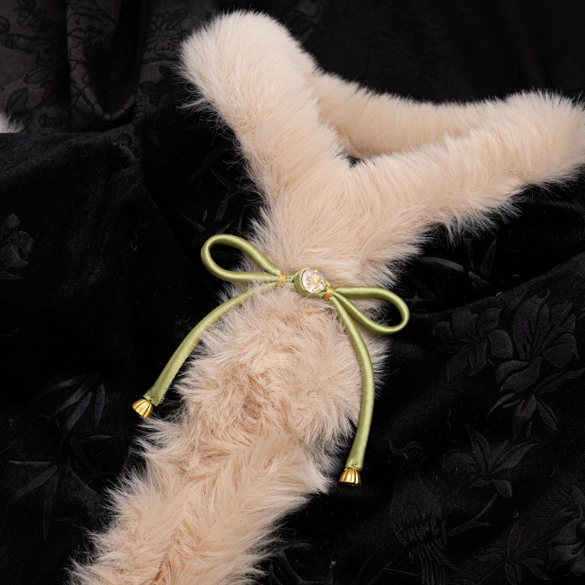 Faux fur scarf button clasp with satin bow, olive-green ribbon loops and round gold-tone center
